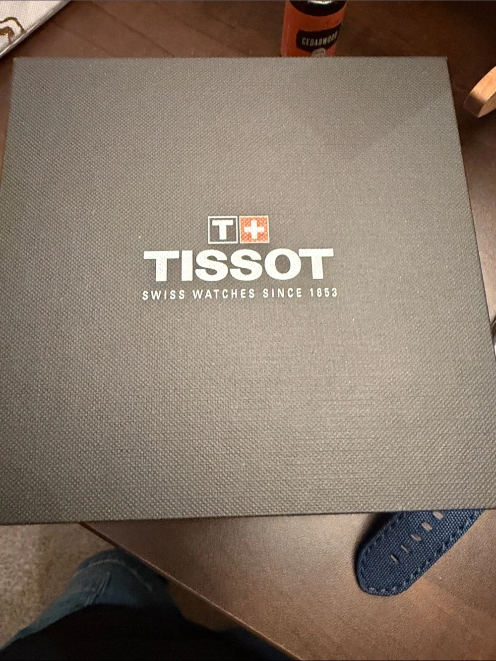 Tissot watch new with tags and Black Box with White Logo and Red Cross Accent